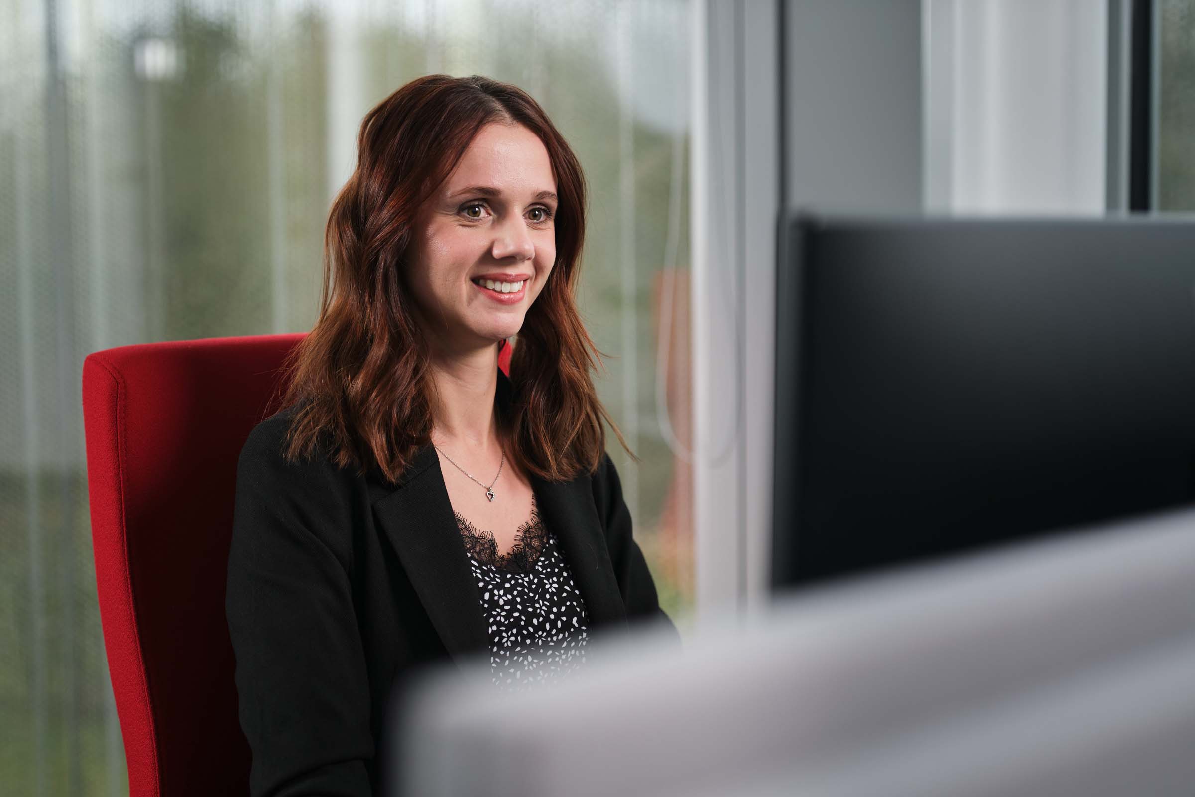 woman working in front of a monitor