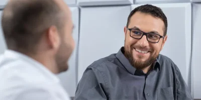 two men conversing