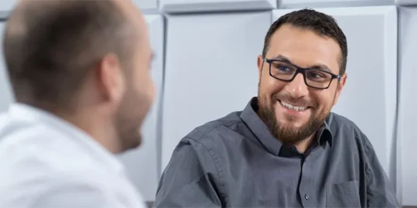 two men conversing